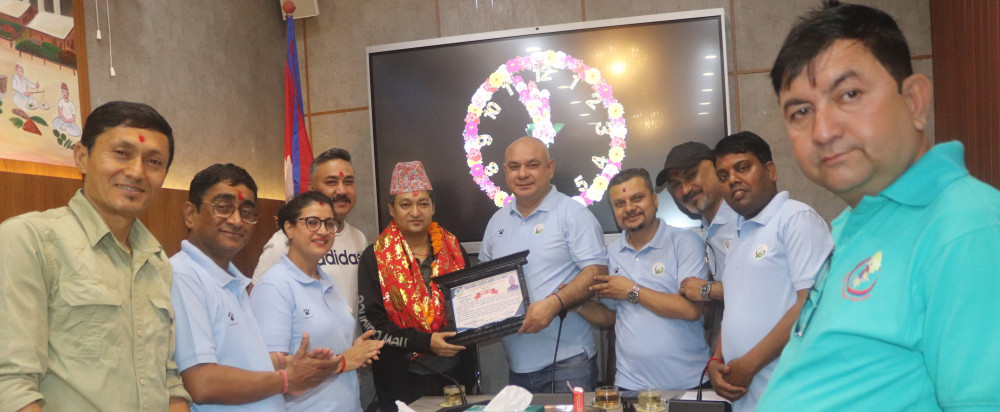 उवा संघको राहत कोषमा धमलाले दिए सहयोग