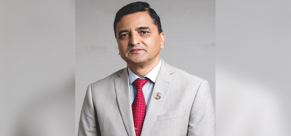 योगेश भट्टराईले फिर्ता गरे रातो पासपोर्ट